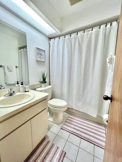 Combined shower/tub, hair dryer, towels, soap