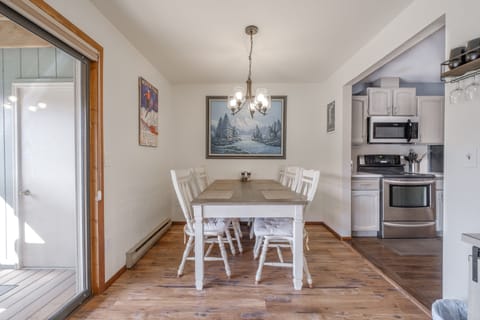 Delight in a meal together or play games at the large table that seats six.