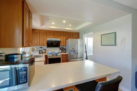 Sleek kitchen counter with a clean finish and island seating