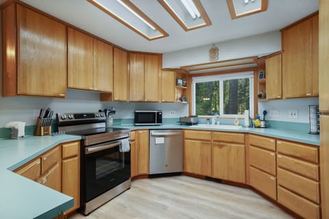 Kitchen with updated modern appliances.