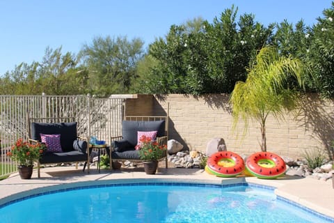 Your backyard oasis awaits! Heated pool (seasonal heating fees apply), outdoor seating, propane firepit, hammock and yard games.