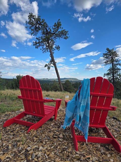 Grab a book and enjoy the views from the famous red chairs!