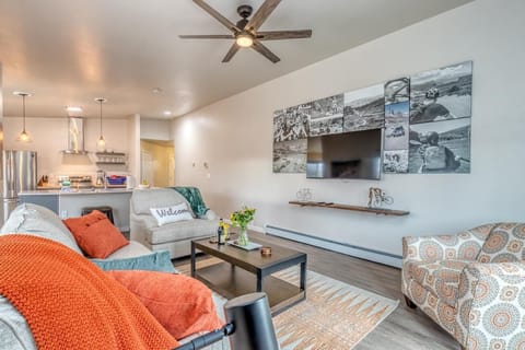 Enjoy movie nights and cozy moments in this inviting living room.