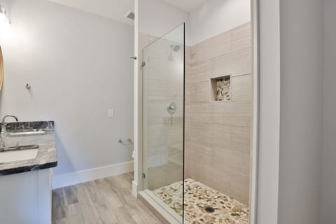 Combined shower/tub, hair dryer, towels, soap