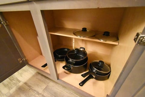 Fridge, coffee/tea maker, cookware/dishes/utensils