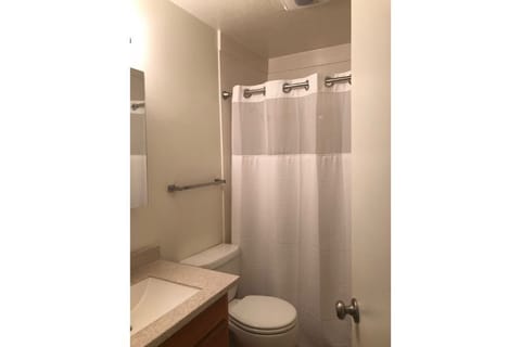 Combined shower/tub, hair dryer, towels, soap