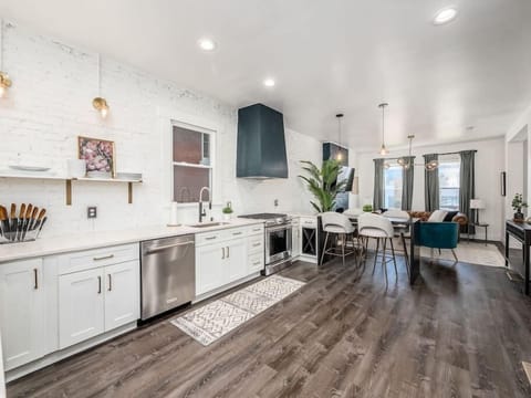 Open concept living! Cook, dine, and relax in this stylish and bright space.