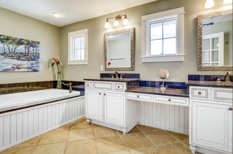 Bathtub, jetted tub, hair dryer, towels