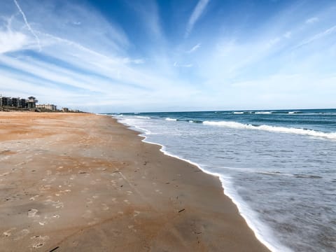 On the beach, sun loungers, beach towels