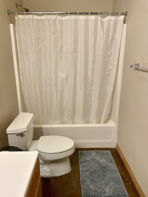 Combined shower/tub, towels, soap, toilet paper