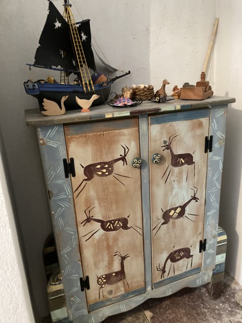 Painted cupboard full of toys for children!