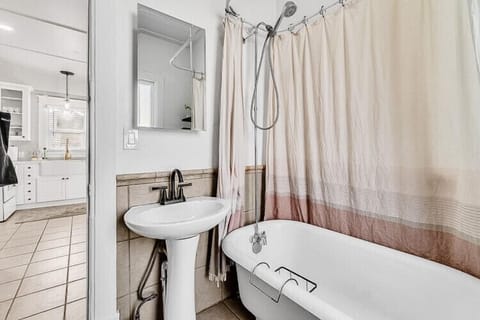 Combined shower/tub, hair dryer, towels, soap