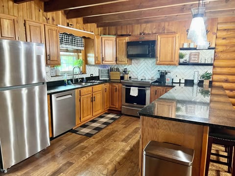 New stainless steel appliances in the fully stocked kitchen.