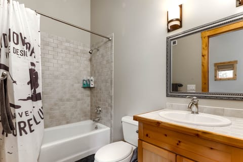 Combined shower/tub, hair dryer, towels, soap