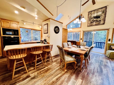 Beautiful and open dining area with breakfast nook. Large families sit together!