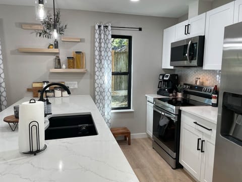 Light bright fully stocked kitchen!