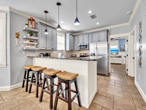 Enjoy Cooking a Great Meal in This Airy Kitchen, Stainless Appliances, Stocked With A Keurig and A Standard Coffee Pot Too.