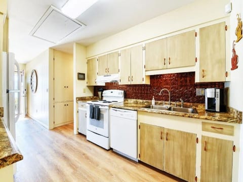 Kitchen with full size appliances, completely stocked with cookware, dishes, utensils & glassware. See "Amenities" for complete list