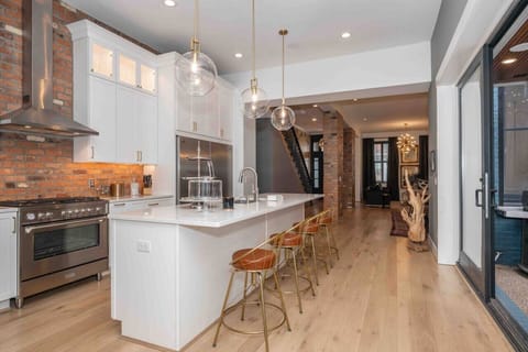 Fully Stocked Kitchen w/ Walk Out to Courtyard