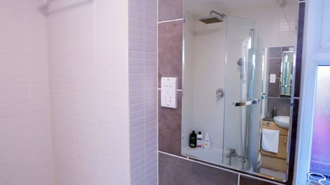 Combined shower/tub, hair dryer, towels, soap