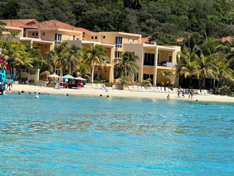 On the beach, sun loungers, beach towels