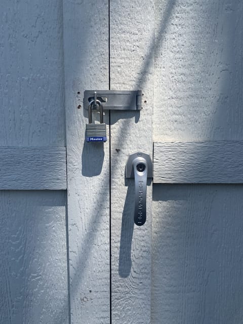 Secure lock on bike house