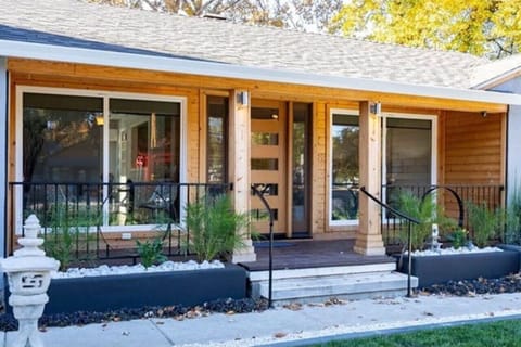 Covered porch perfect for enjoying beautiful Chico weather. 2 rocking chairs have been recently added