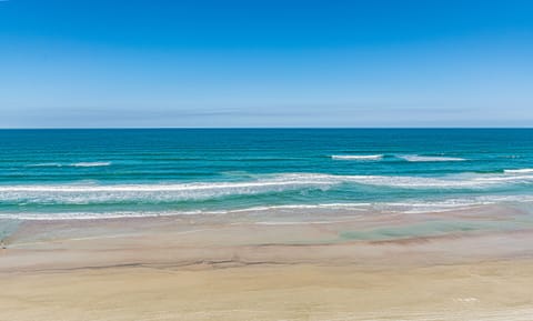 On the beach, sun loungers, beach towels