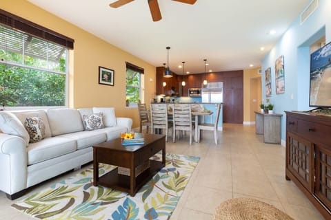 Spacious open plan living, dining, and kitchen area.