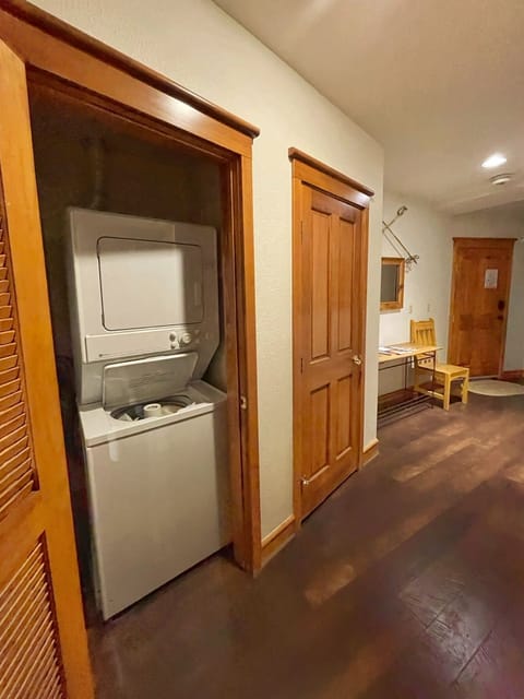 Washer/dryer in unit and economy detergent provided. 