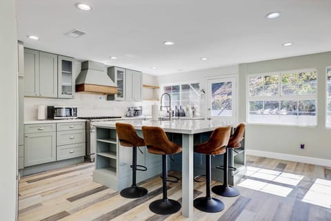 Custom kitchen cabinets and quartz countertops.