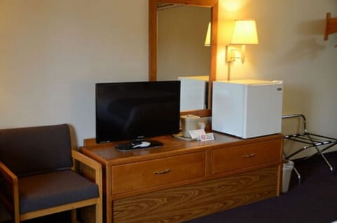 This unit features a TV and mini-fridge