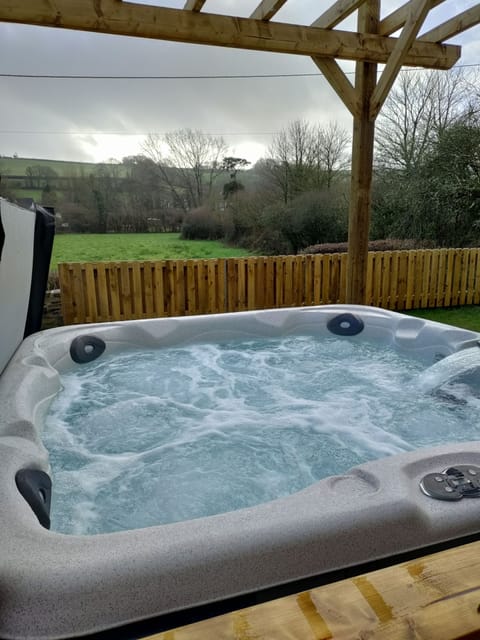 Hot tub with views over the valley.