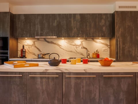 Kitchen, Countertop, Flooring, Interior Design, Furniture, Cabinetry, Kitchen Appliance, Food, Wood Stain, Kitchen Stove