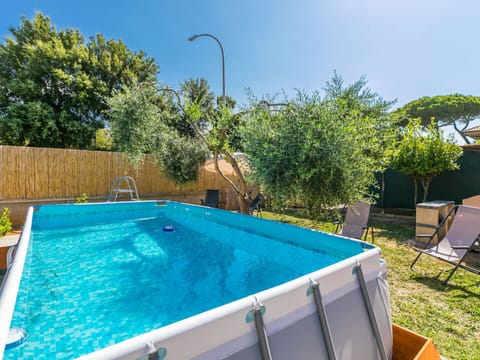 Water, Plant, Sky, Property, Swimming Pool, Azure, Street Light, Shade, Building, Leisure