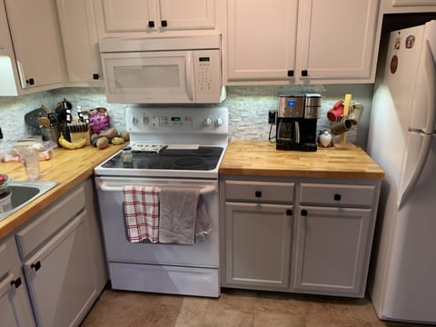 Cabinets are FULL with all your culinary needs!Pots/Pans/bakeware/glasses/spices