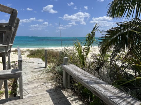 On the beach, sun loungers, beach towels