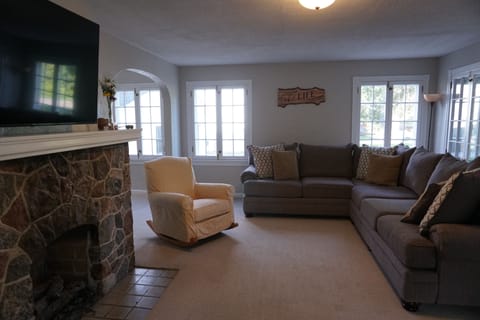 Living room with plenty of sitting space for the whole family.