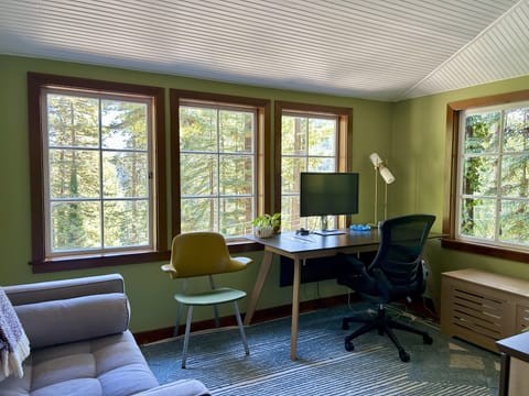 The sunny office includes ample room to work