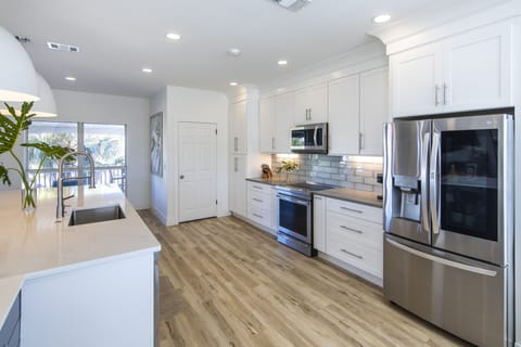 2nd fl spacious kitchen w/ laundry room. 