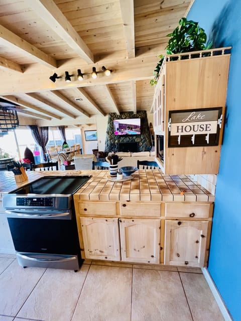 A fully stocked kitchen and it's just one of the smart TV’s to enjoy.