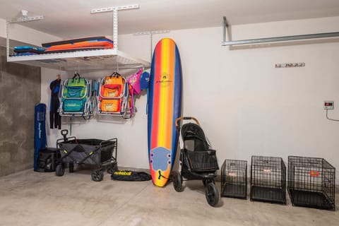 The finished garage is loaded with beach chairs and toys so that you're well-equipped for endless fun in the sun.