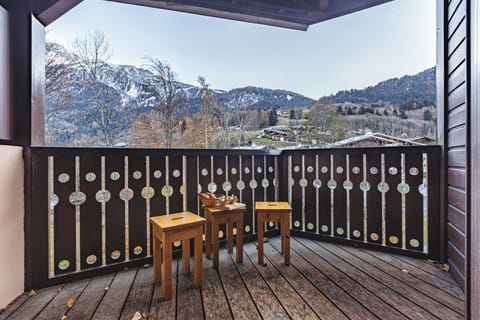 Large balcony with mountain view