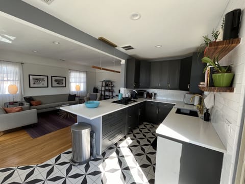 Microwave, Toaster oven, Keurig and Drip coffee makers, Tea kettle provided