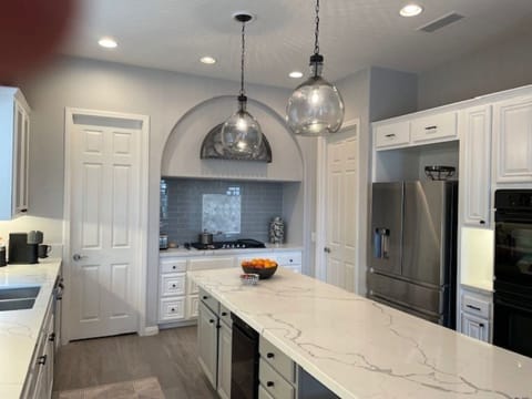 Kitchen and Access to Laundry and Pantry