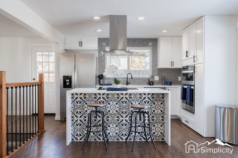 Experience modern luxury in this fully remodeled home. The spotless kitchen is bright and inviting! 