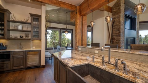 Gourmet kitchen looking into breakfast nook