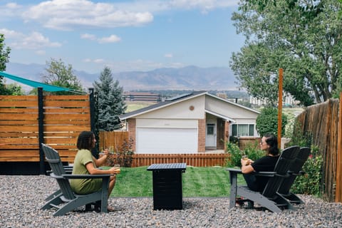 Enjoy the backyard - sit in the Adirondack chairs surrounding the fire table.