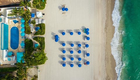 On the beach, sun loungers, beach towels