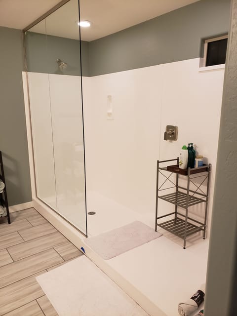 Combined shower/tub, hair dryer, towels, soap